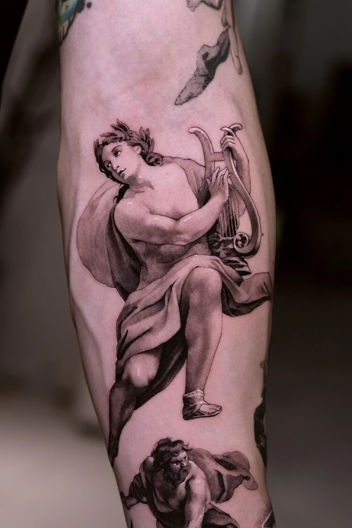 Apollo tattoo on the forearm by Moussa in Shanghai