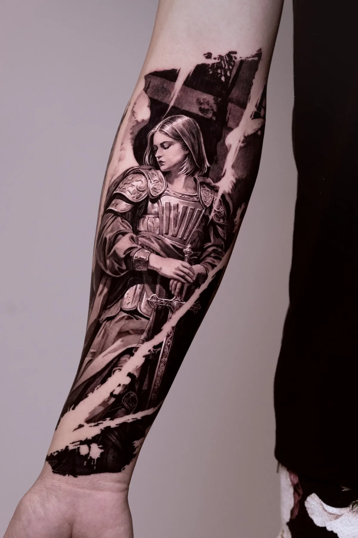 Archangel Michael tattoo on the arm by Moussa in Shanghai
