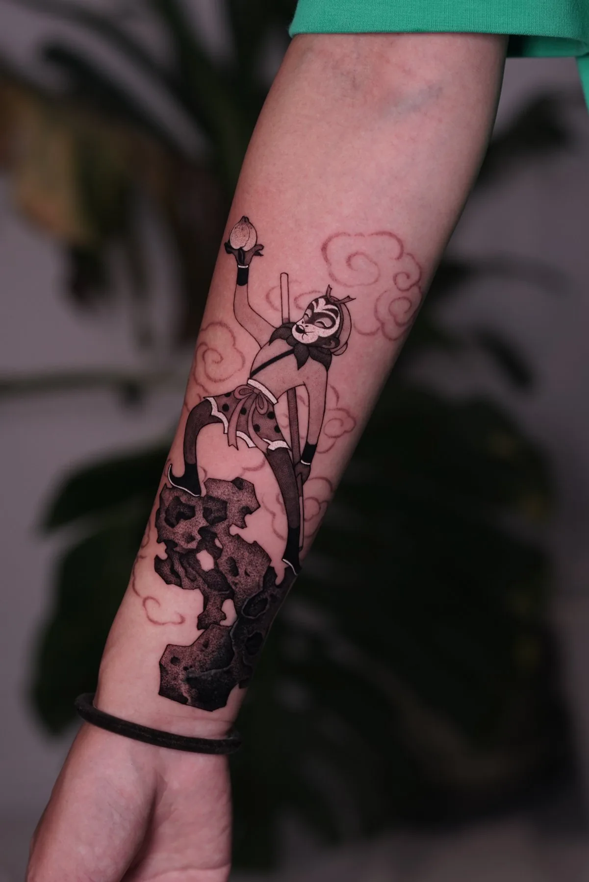 Character / Illustration tattoo on the arm by Moussa in Shanghai