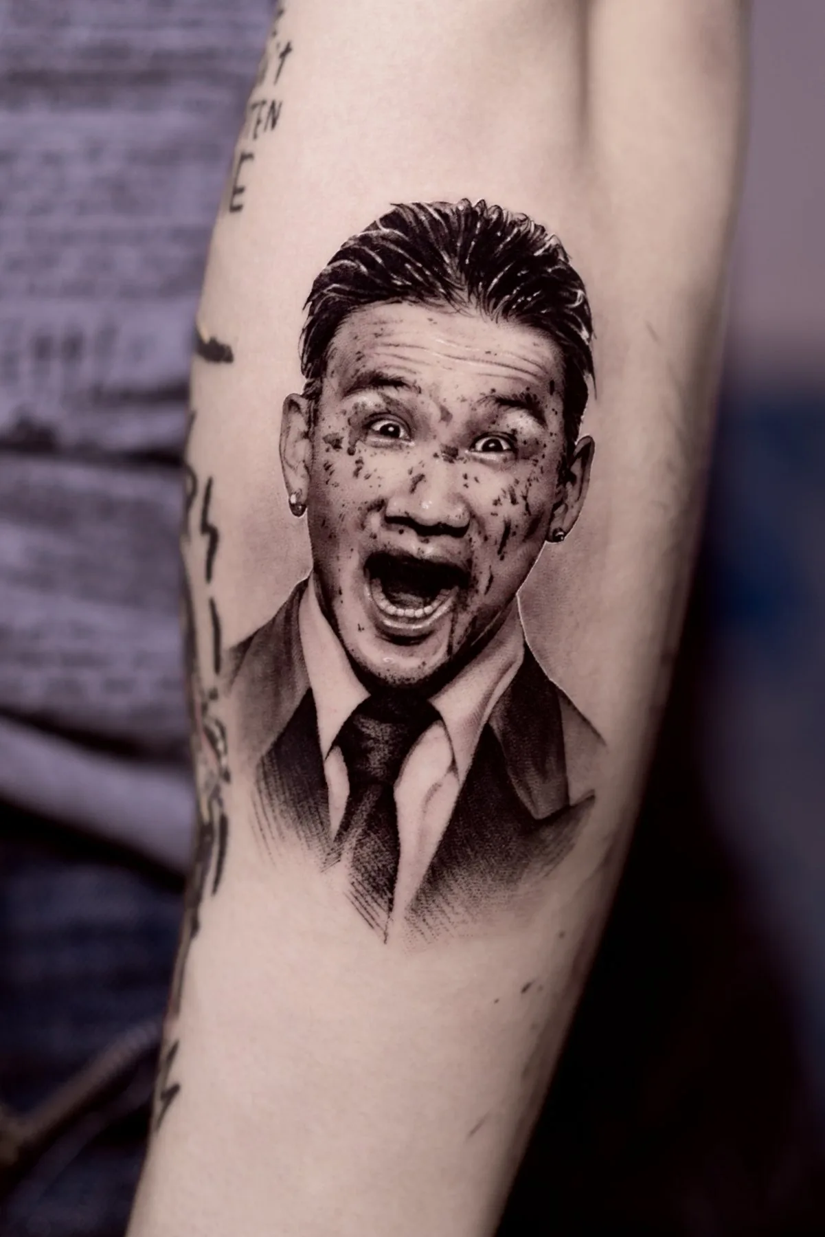 Cinematic / Portrait tattoo on the arm by Moussa in Shanghai
