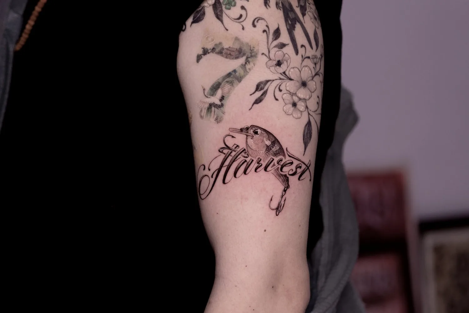 Lure / Lettering tattoo on the arm by Moussa in Shanghai