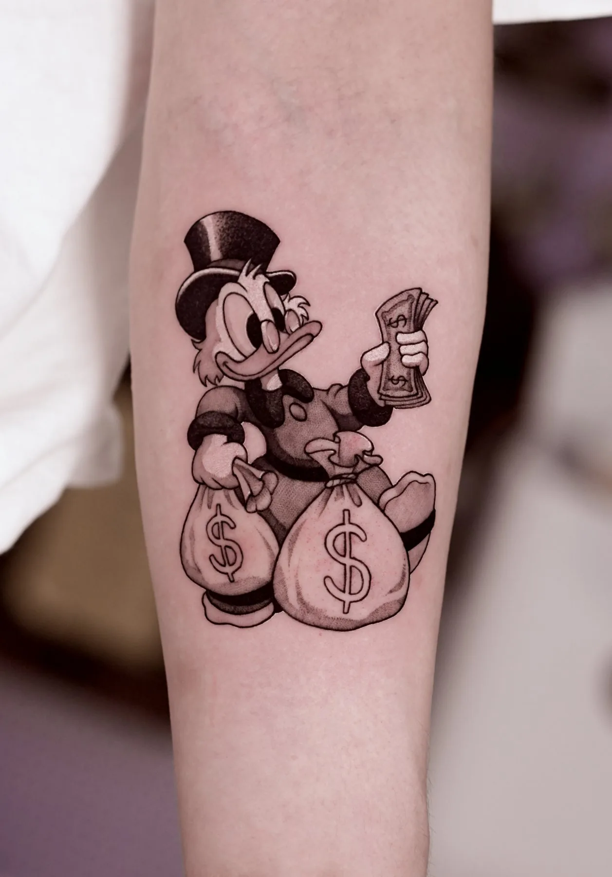 Scrooge / Illustration tattoo on the arm by Moussa in Shanghai