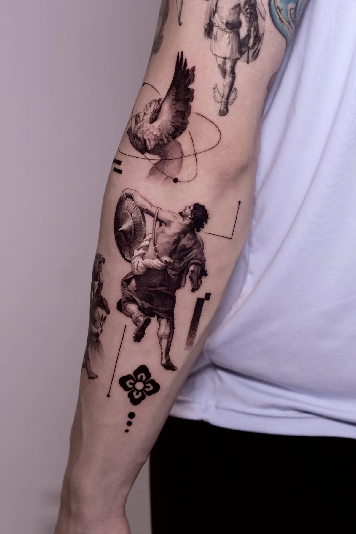 Vulcan / Collage tattoo on the arm by Moussa in Shanghai