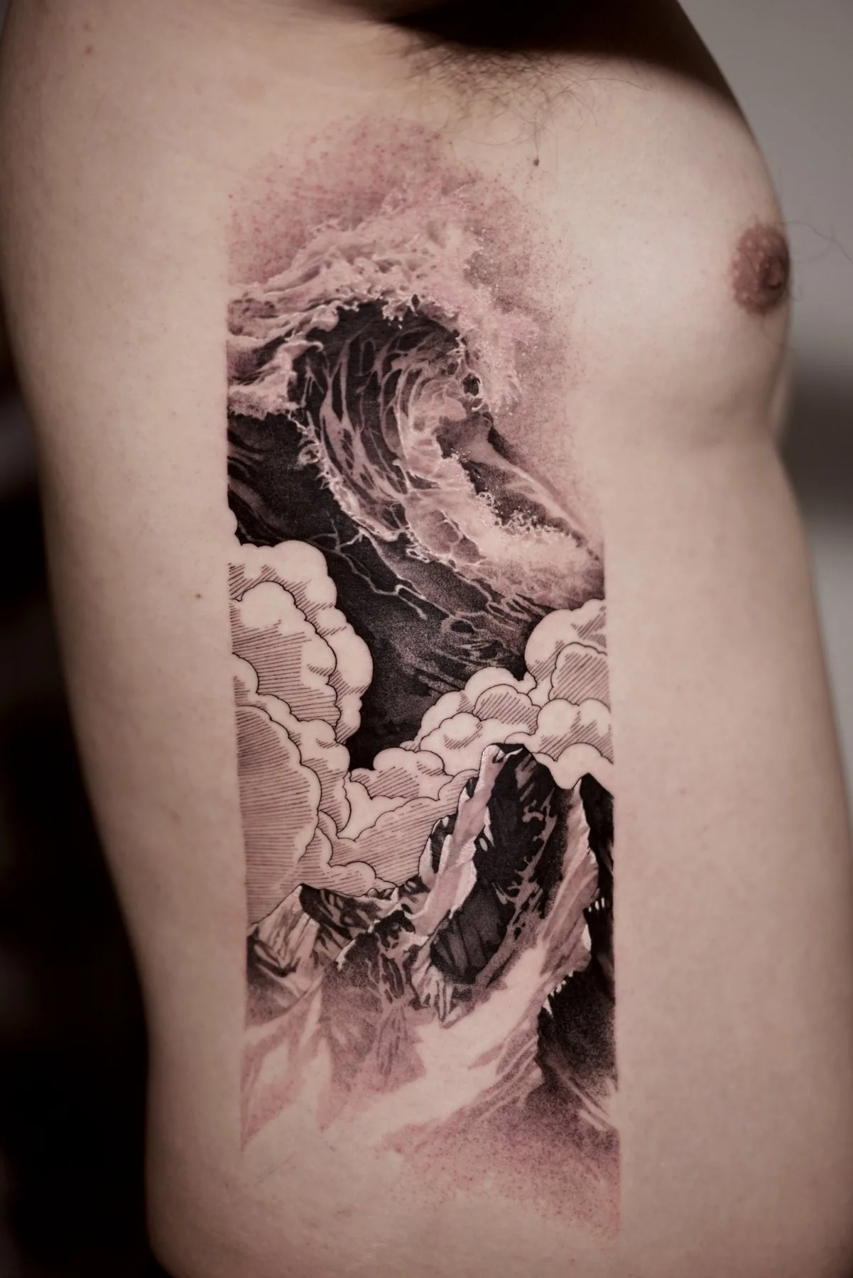 Wave / Landscape tattoo on the torso by Moussa in Shanghai